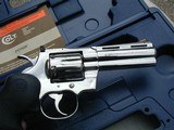 COLT PYTHON, 1994, 4" POLISHED STAINLESS, NEW, UNFIRED IN BOX - 3 of 10