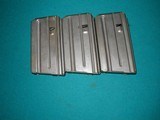 COLT EARLY AR 15 MAGS, THREE,
MARKED COLT ,
.223 WITH METAL FOLLOWER