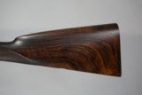 a matched pair of 12 bore James Woodward Automatic sidelock extractor shotguns. - 8 of 15