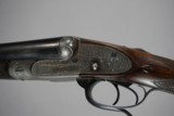 a matched pair of 12 bore James Woodward Automatic sidelock extractor shotguns. - 13 of 15