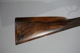 a matched pair of 12 bore James Woodward Automatic sidelock extractor shotguns. - 5 of 15