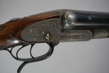 a matched pair of 12 bore James Woodward Automatic sidelock extractor shotguns. - 14 of 15