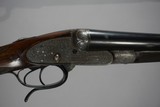 a matched pair of 12 bore James Woodward Automatic sidelock extractor shotguns. - 11 of 15