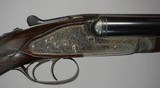 Outstanding Rigby Rising bite 400-350 double rifle.