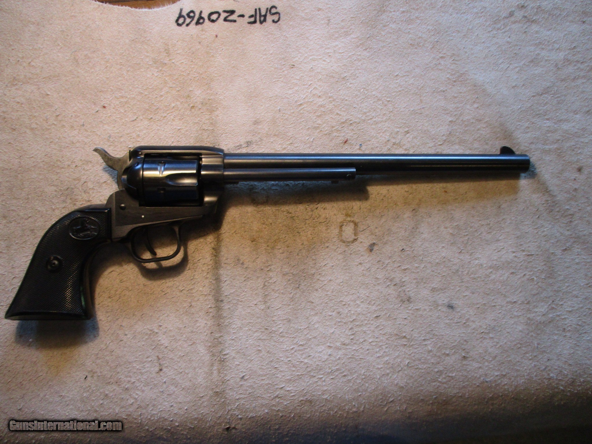 Colt Scout Buntline, 22LR, 9" barrel, 6 shot, unfired in box, 1959