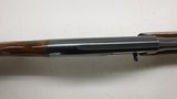 Remington 1100 12ga, 24