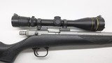 Knight MK 85 Stainless Synthetic 50 Cal Leupold Vari-X III 4.5-14 AO PSBP01 - 1 of 21
