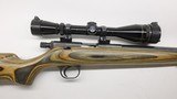 Knight MK 85 Blue Laminated 50 Cal Leupold Vari-X IIC 4-12 - 1 of 22