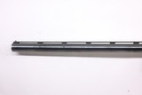 Remington 1100 12ga 26