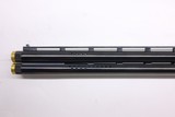 Browning Citori CXT Trap Adj comb 12ga 32