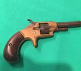Eli Whitney Fiream Company -brass fram 7 shot 22 r.f. Oct barrel 3/1/4