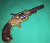 Eli Whitney Fiream Company -brass fram 7 shot 22 r.f. Oct barrel 3/1/4