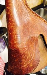 Cowboy holster -1920's tan leather -original etched scroling
- 4 of 6