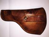 Cowboy holster -1920's tan leather -original etched scroling
- 6 of 6
