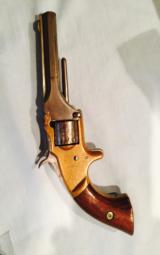 7 shot 22 cal spur trigger -brass frame - 1 of 4