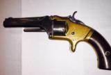 S&W first model - 7 shot 22 caliber-
brass frame-
spur trigger -made in 1866 - 5 of 10