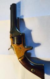 S&W first model - 7 shot 22 caliber-
brass frame-
spur trigger -made in 1866 - 3 of 10