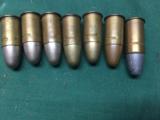 7 455 caliber bullets -5 English, -2 are Colt - 1 of 4