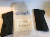 Black plastic Walther PP grips in original plastic factory package - 1 of 3