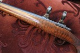 Cooper *Custom Rifle* Varmint Extreme* Model 38 in 17 Ackley Hornet Color Case
*Gorgeous* AAA+ Wood - 1 of 15