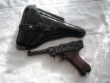 MAUSER BANNER "V" SUFFIX LUGER CODE
1939 MFG COMMERCIAL IN LIKE NEW ORIGINAL W/MATCHING MAGAZINE AND HOLSTER - 20 of 20