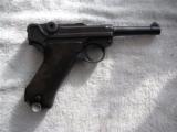 MAUSER BANNER "V" SUFFIX LUGER CODE
1939 MFG COMMERCIAL IN LIKE NEW ORIGINAL W/MATCHING MAGAZINE AND HOLSTER - 10 of 20