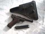 MAUSER BANNER "V" SUFFIX LUGER CODE
1939 MFG COMMERCIAL IN LIKE NEW ORIGINAL W/MATCHING MAGAZINE AND HOLSTER - 1 of 20