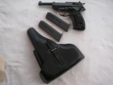EXTREMELY RARE 1942 DATED HIGH POLISHED P.38 WALTHER
WITH 2 MATCHING S/N MAGS - 1 of 20