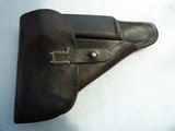 1943 DATED P38 UWa STAMPED HOLSTER IN GOOD SHAPE
