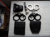 3 PAIRS OF HANDCUFFS IN NEW FACTORY CONDITION - 1 of 16