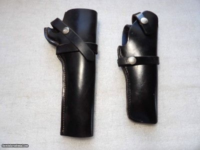 2 HOLSTERS IN LIKE NEW ORIGINAL CONDITION