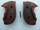 NRA ENGRAVED ROSEWOOD BEAUTIFUL REVOLVER GRIPS IN NEW ORIGINAL CONDITION - Image 11 of 16