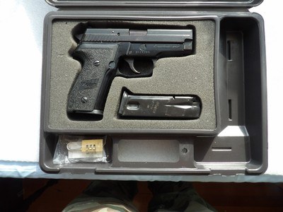 SIG SAUER P229 SEMI AUTO PICTOL IN LIKE NEW FACTORY IN BOX CONDITION