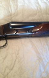 Winchester model 21 12 gashotgun manufactured 11/22/1935 serial 4055 factory refinished 5/16/1974
- 1 of 4