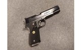 Colt ~ 1911 ~ .22 LR / .45 ACP - 1 of 7