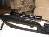 Winchester
Model
70 Sniper Sharpshooter .300 Win. Magnum
with Mc Millen Stock
and 1000 yd. Ranging Scope - 2 of 5