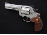 Smith & Wesson Model 686-5, Jeff Flannery Engraved, Cal. .357 Magnum
4 Inch Stainless
S&W Mod. 686
- 3 of 9