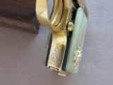 Custom Gold Plated & Engraved Bauer .25 Auto with 14K Lion Head Grips
SOLD - 17 of 25