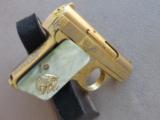 Custom Gold Plated & Engraved Bauer .25 Auto with 14K Lion Head Grips
SOLD - 23 of 25