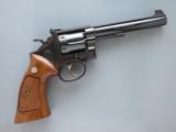Smith & Wesson Model 14, Single Action K-38, Cal. .38 Special, 6 Inch Barrel, Optional Factory Target Features
SOLD - 2 of 7