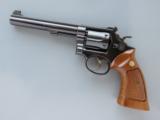 Smith & Wesson Model 14, Single Action K-38, Cal. .38 Special, 6 Inch Barrel, Optional Factory Target Features
SOLD - 4 of 7