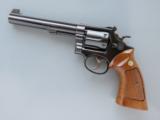 Smith & Wesson Model 14, Single Action K-38, Cal. .38 Special, 6 Inch Barrel, Optional Factory Target Features
SOLD - 1 of 7
