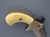 Colt Third Model Derringer .41 RF, Engraved with Ivory Grips
SOLD - 5 of 6