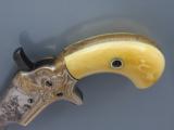 Colt Third Model Derringer .41 RF, Engraved with Ivory Grips
SOLD - 4 of 6