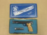 1980 Smith & Wesson Model 41 .22 Target Pistol w/ 7 3/8ths Barrel with the Original Box & Tool Kit -
EXCELLENT - 2 of 25