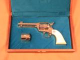 Colt Single Action, 3rd Gen., Cal. .45 ACP/.45 LC Dual Cylinders, 4 3/4 Inch Barrel, Nickel Finished - 1 of 9