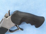 Thompson Center Arms Super Contender Super 14, Stainless Steel & Rynite, Cal. .45 Colt - .410 Ga.
SOLD - 6 of 11