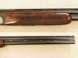 Beretta Model
687 EELL Skeet Diamond Pigeon with Adjustable Stock, 12 Gauge with .410, .28, and .20 Sub Gauge Tubes SOLD - 8 of 18