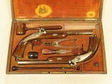 Cased French Dueling Pistols, " AURY A, ST. ETIENNE " SOLD - 1 of 16