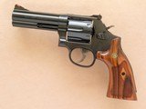 Smith & Wesson Model 586 Classic Distinguished Combat
Magnum, Cal. .357 Magnum, 4 Inch Barrel SOLD - 1 of 8